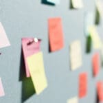 Sticky notes pinned to a wall
