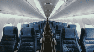Empty airplane with blue seats
