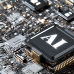 computer motherboard with chip installed that says AI.